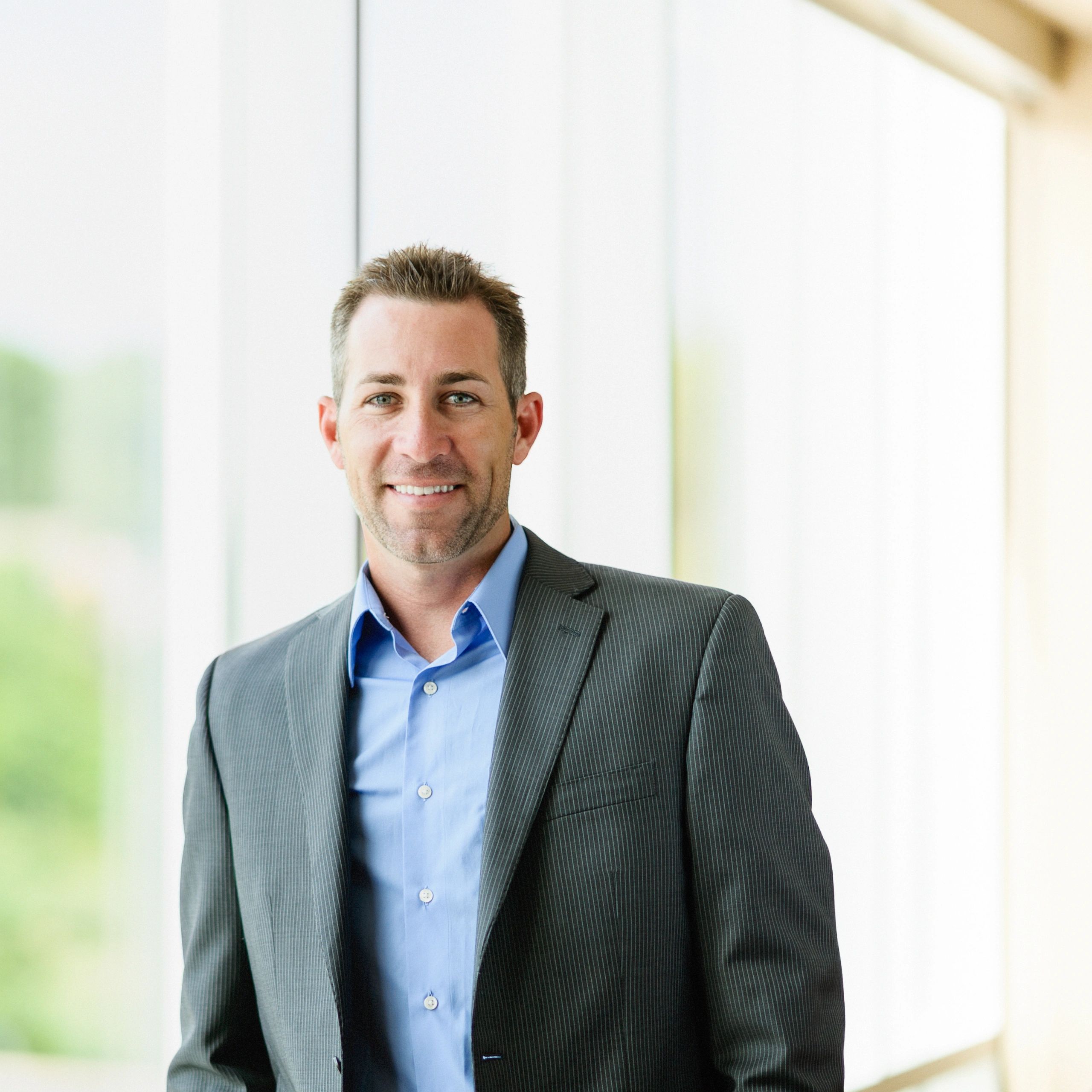 Professional headshot of a consultant