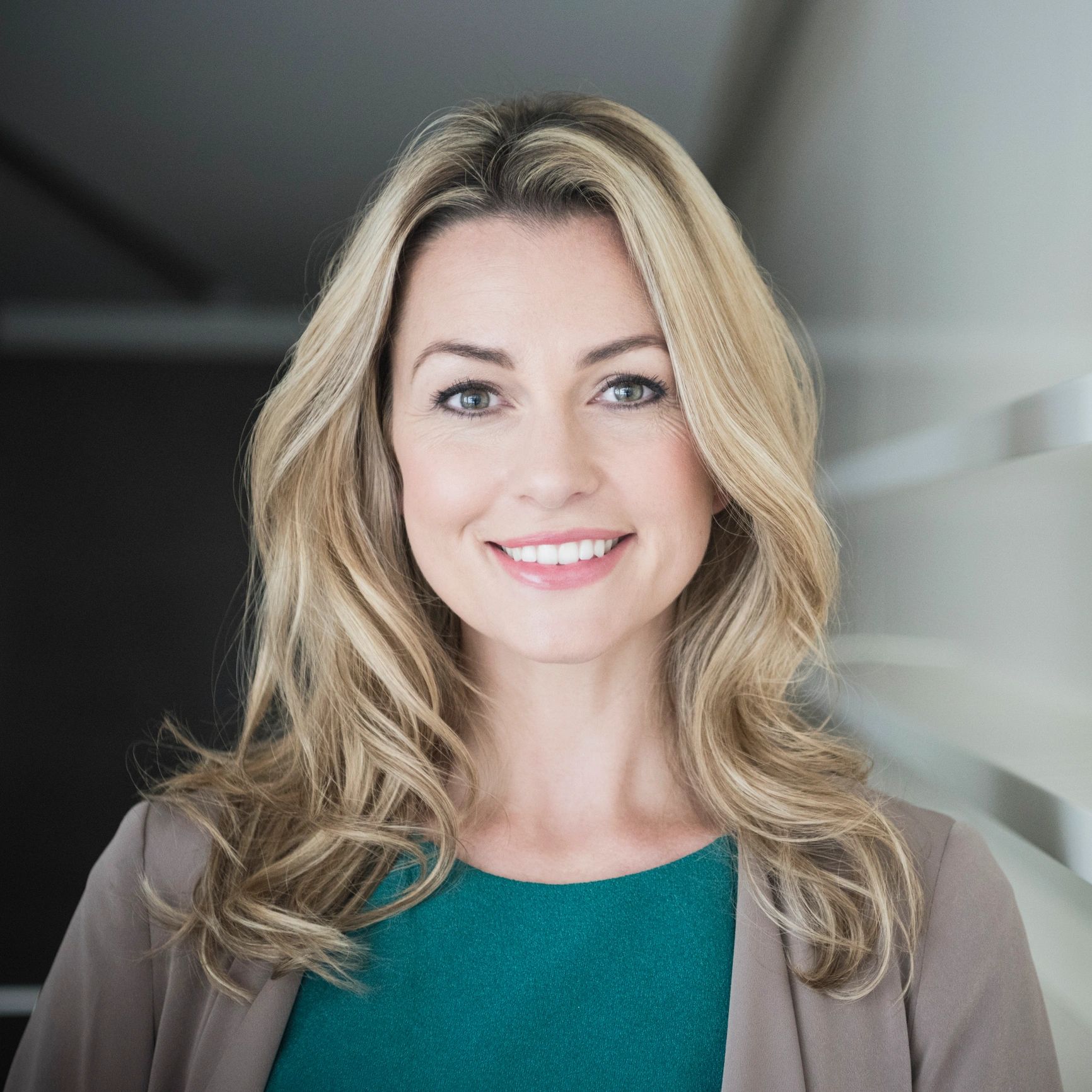 Professional headshot of a woman smiling